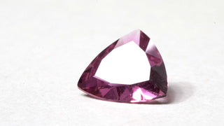 Granato viola triangolare 0.00CT