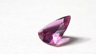 Granato viola triangolare 0.00CT