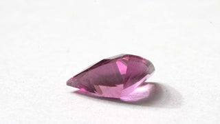 Granato viola triangolare 0.00CT